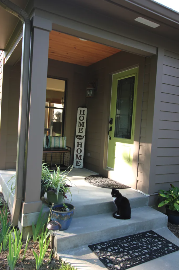 We remodeled this porch for a home in Owensville, Ohio. It involved pouring new concrete, adding new siding and a cedar ceiling, painting and hanging a new front door. We love what the owner did to this space after we were gone. So does the cat! Are you looking to makeover your front porch. We can help. Call us today to talk about your project.