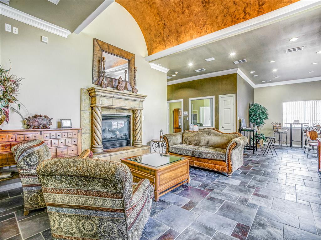 Community clubhouse fireplace with tile flooring