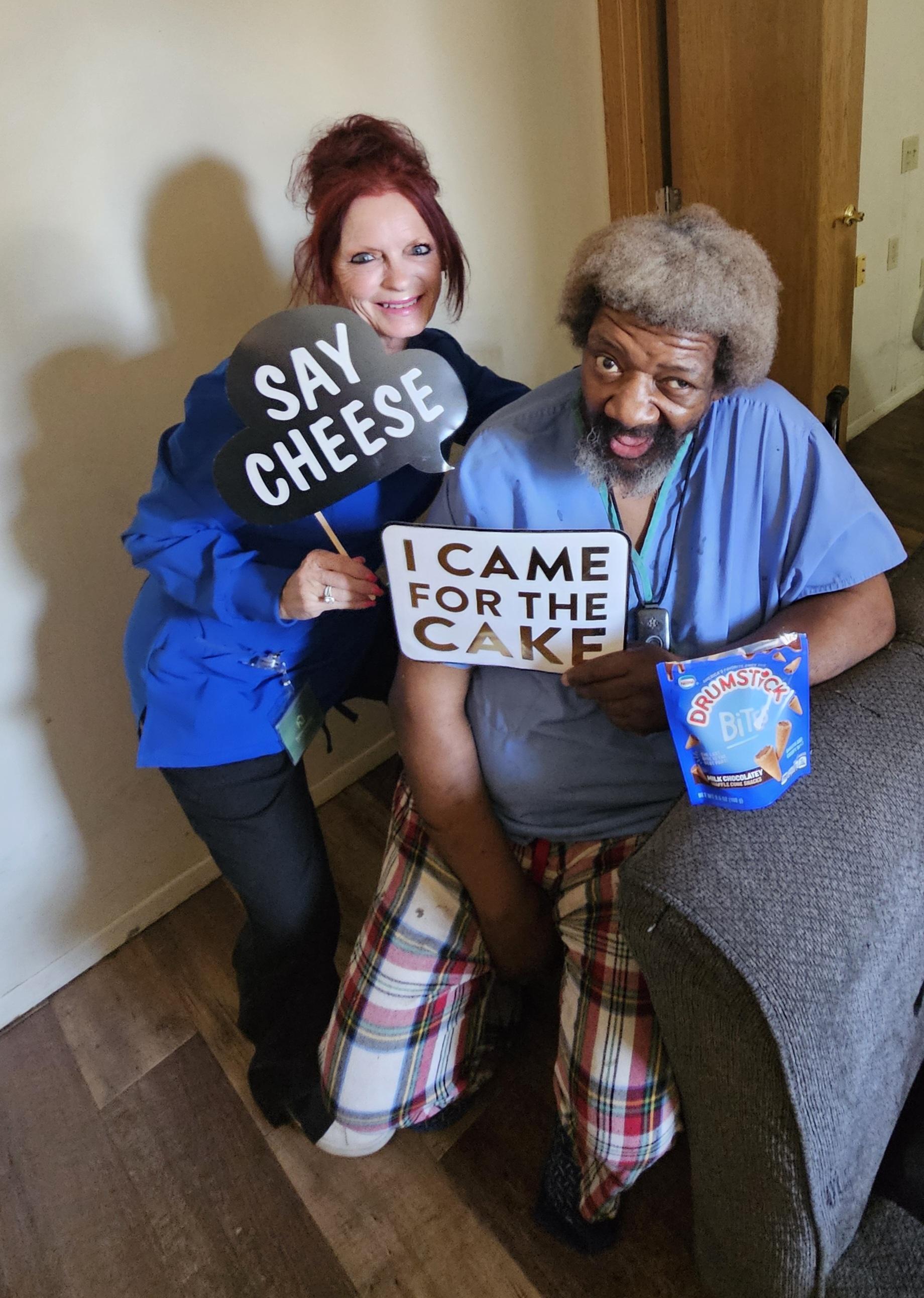 Caregiver engaging with an older adult through meaningful activities and companionship.