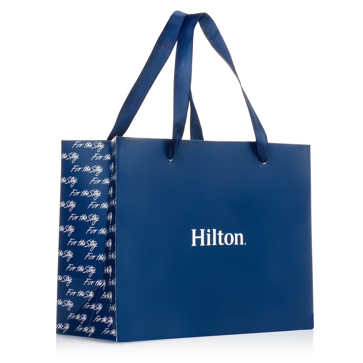 Paper shopping bag for Hilton. Custom packaging by PLC Print.