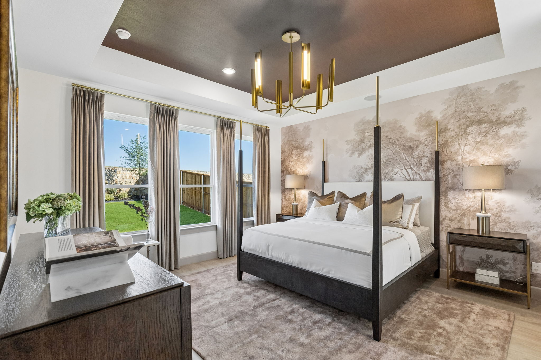 Owner's suite in the Rainwater Crossing model home in Celina, TX.
