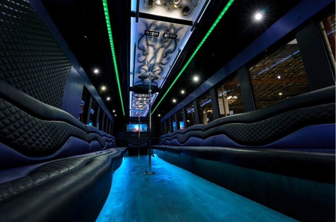 Las Vegas Party Bus 40+ Passenger Bus BIG Money Interior with bar, two dance poles and state of the art sound and lighting.