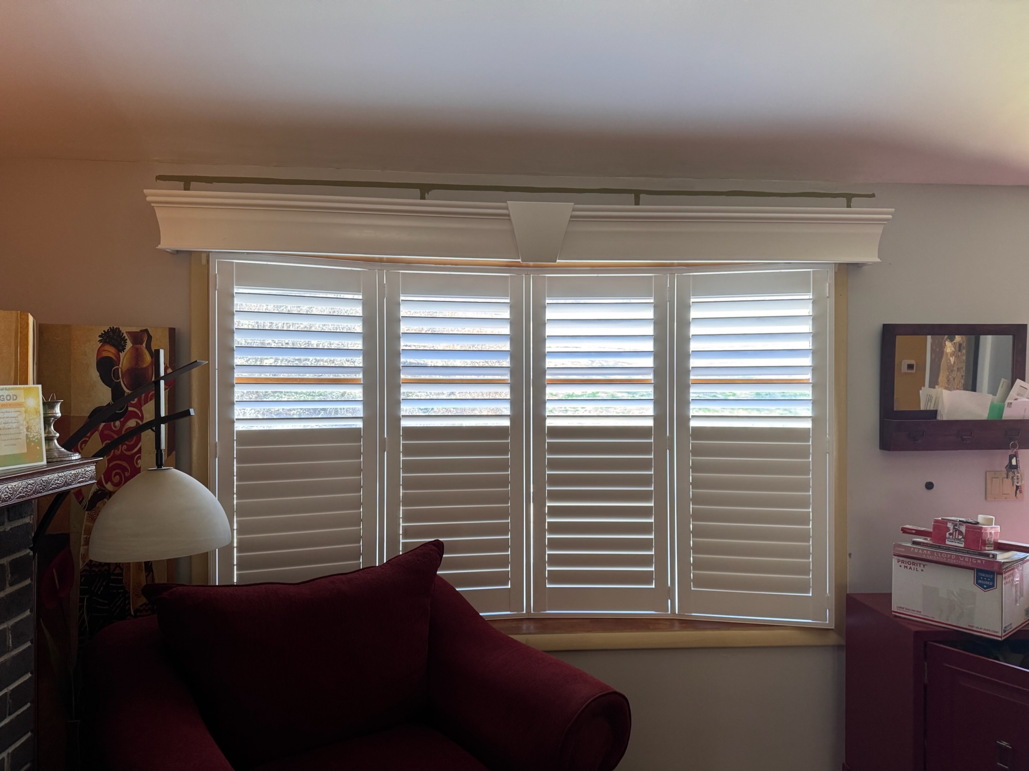 Interior shutters are a unique option for your bow window.