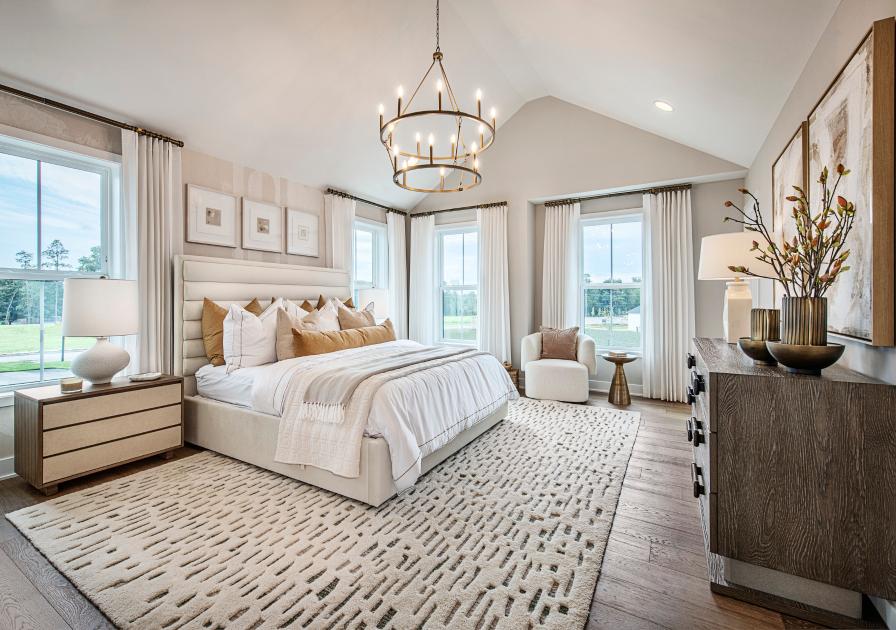 Luxurious primary bedroom suites with large walk-in closets