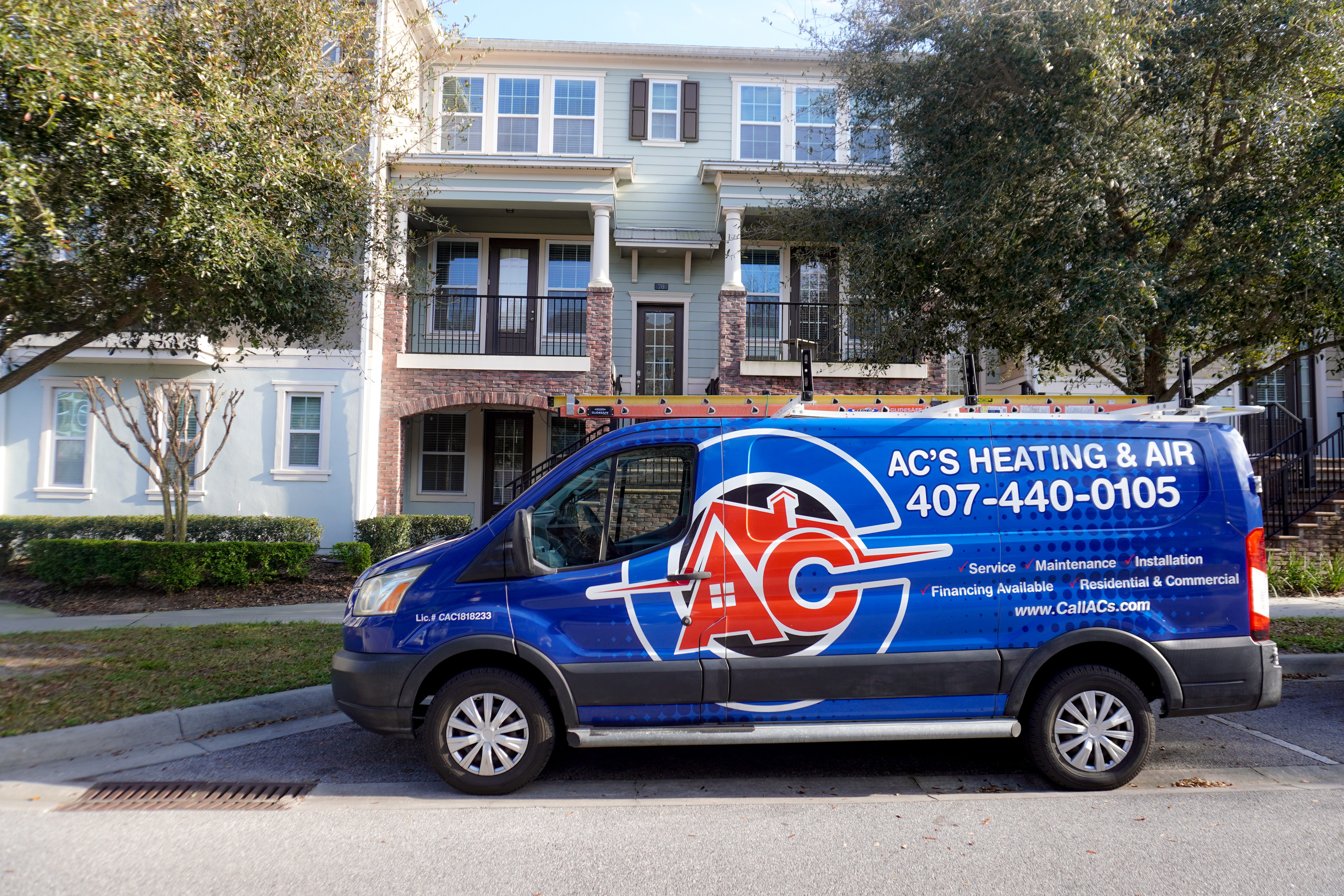 AC's Heating & Air van parked