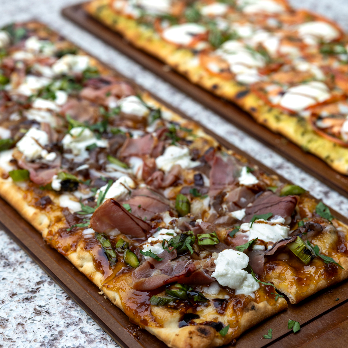 Fig & Prosciutto Flatbread | onions, asparagus, mozzarella, fig jam, goat cheese & balsamic