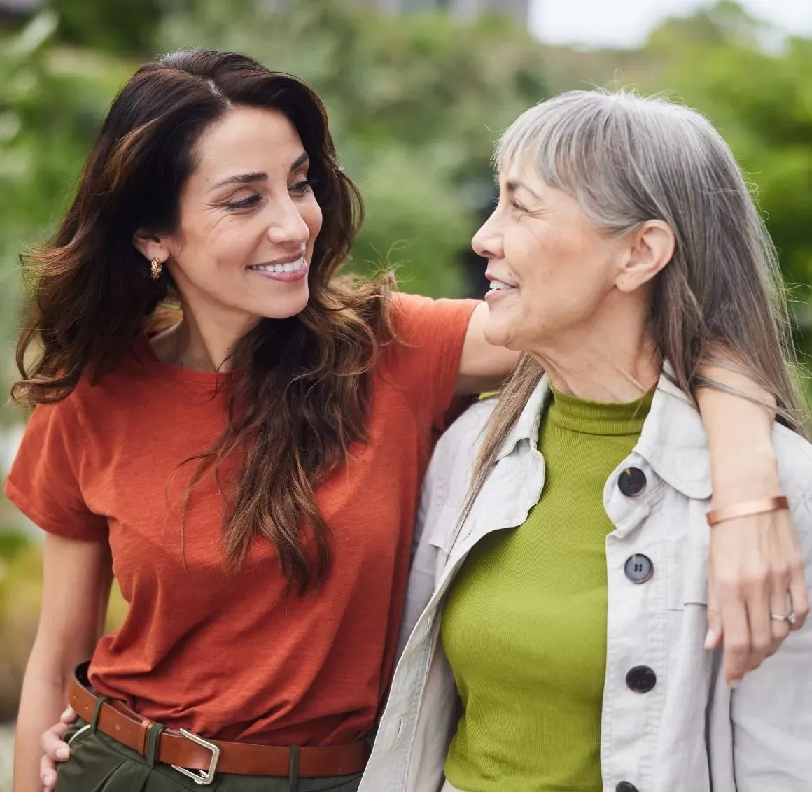 Caregiver with Elderly Woman Outdoors
Two women enjoy a peaceful walk together, side by side and arm in arm. Whether it's a stroll through the neighborhood or a moment of fresh air, caregivers are there to support independence and enrich daily life &mdash; one step at a time.