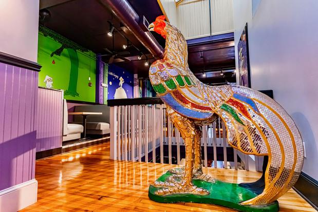 mellow mushroom rooster statue