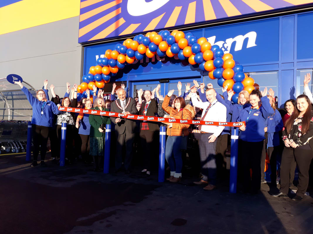 Cllr Dennis Teasdale and representatives from local charity I Am Main were invited to cut the ribbon at B&M's newest store opening in Eston, Middlesbrough.