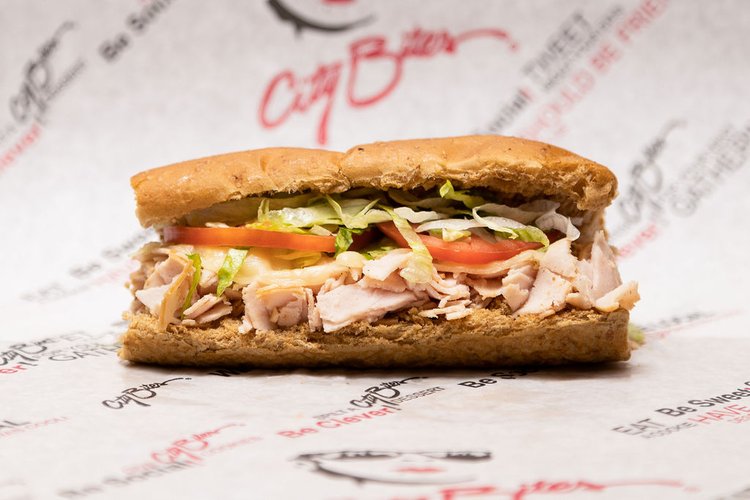 Grilled turkey breast, melted provolone, lettuce, tomatoes, mayo, salt & pepper.