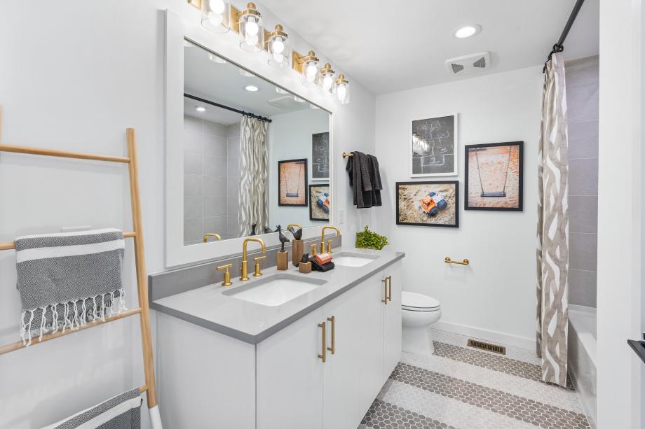 Hall bathroom with dual sink vanity