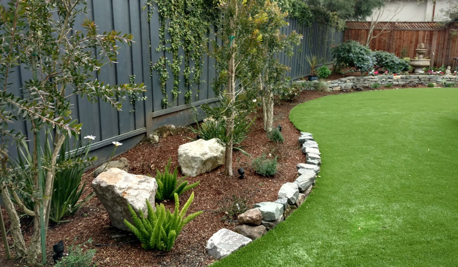 Designed Landscaping Inc Photo