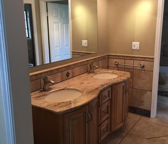 A thirty-five year old bathroom was transformed by SERVPRO's construction team. A water damaged vanity room was gutted and rebuilt. It feels great to be able to repair damage and make it better than before.