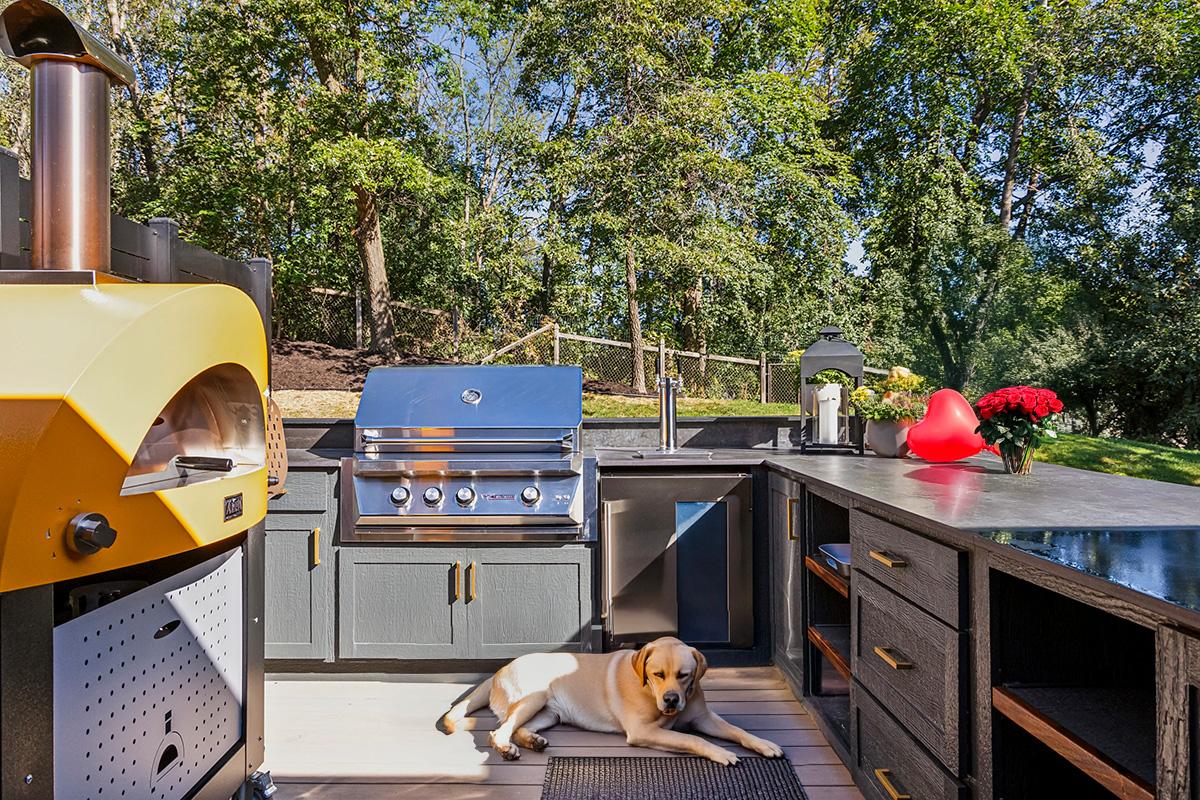Outdoor Kitchen with Pizza Over and Specialty Cooking Equipemnt
