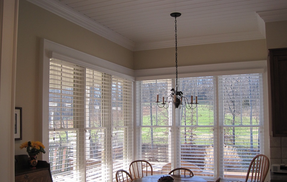 Faux Wood Blinds by Budget Blinds of Knoxville & Maryville make it easy to switch from full light to Budget Blinds of Knoxville & Maryville Knoxville (865)588-3377