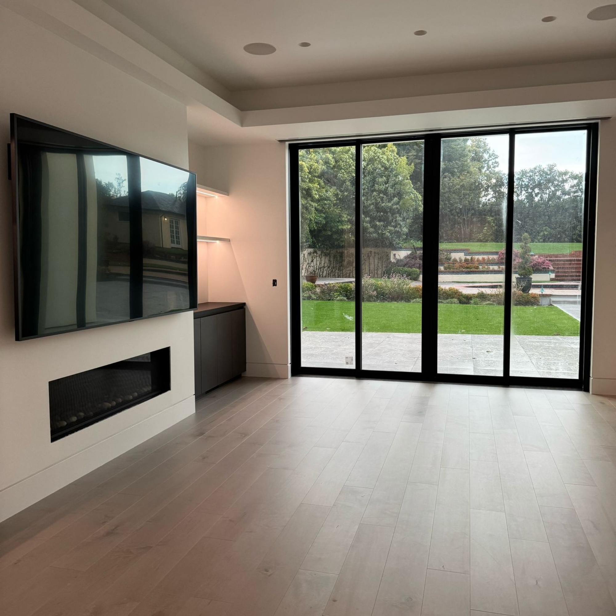 Stylish bedroom with large windows.