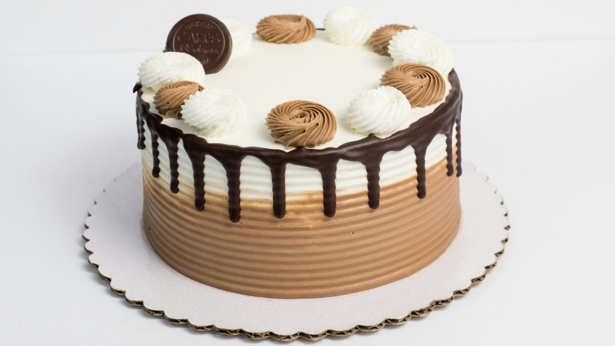 Ready-made chocolate drip cake available for purchase daily. 