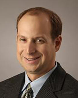 Headshot of Neil A. Mushlin, DO, MBA, MBA