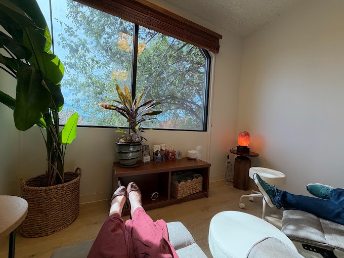 Enjoying an IV with a view and a friend at Flow Wellness in Bend.