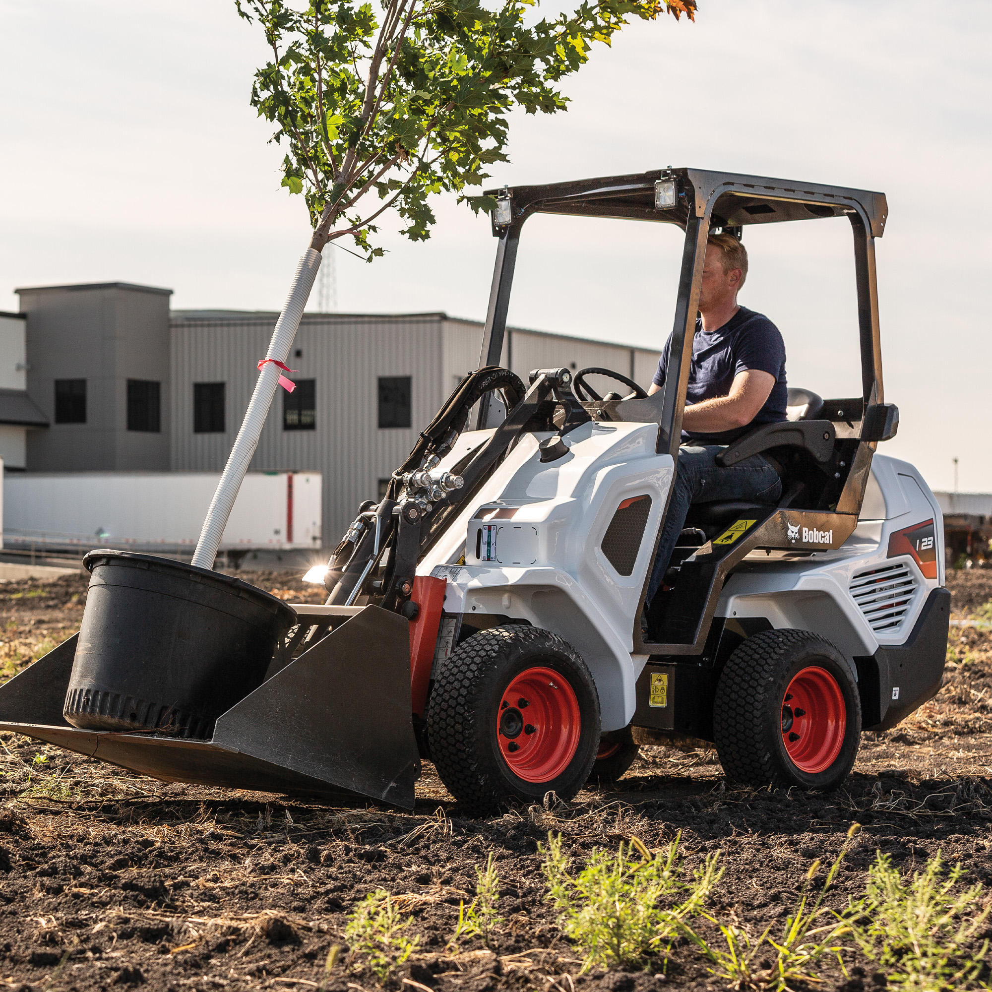 A Bobcat L23 small articulated loader with bucket attachment Pattison Agriculture Limited Swift Current (306)773-9351