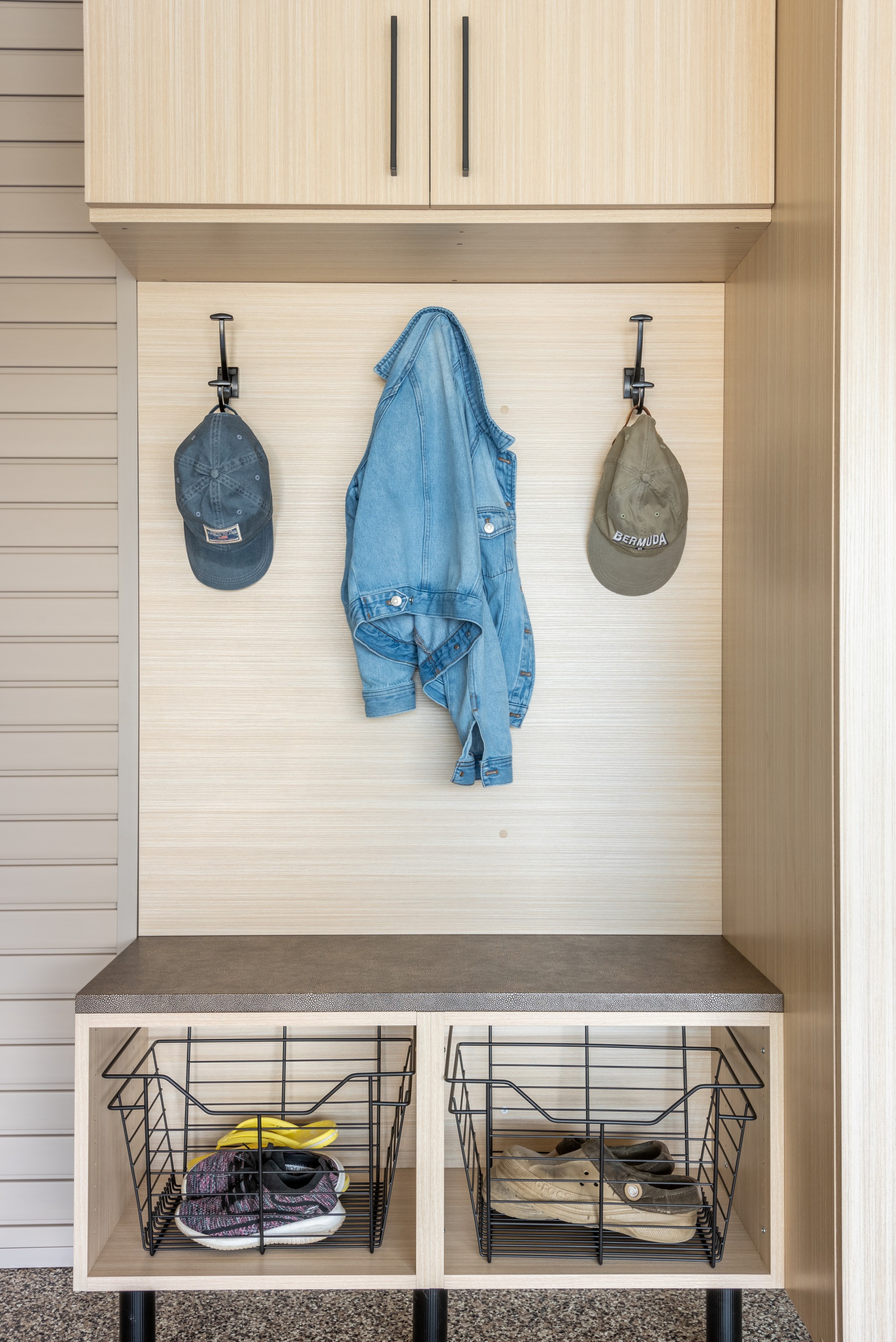 Got a mudroom? Wish you did? You can easily add this feature to your Lancaster, PA garage! Start with a beautiful epoxy floor, then add custom cabinets, a few hooks, and a leather bench seat to top it all off. Call PremierGarage today and we'll show you how!