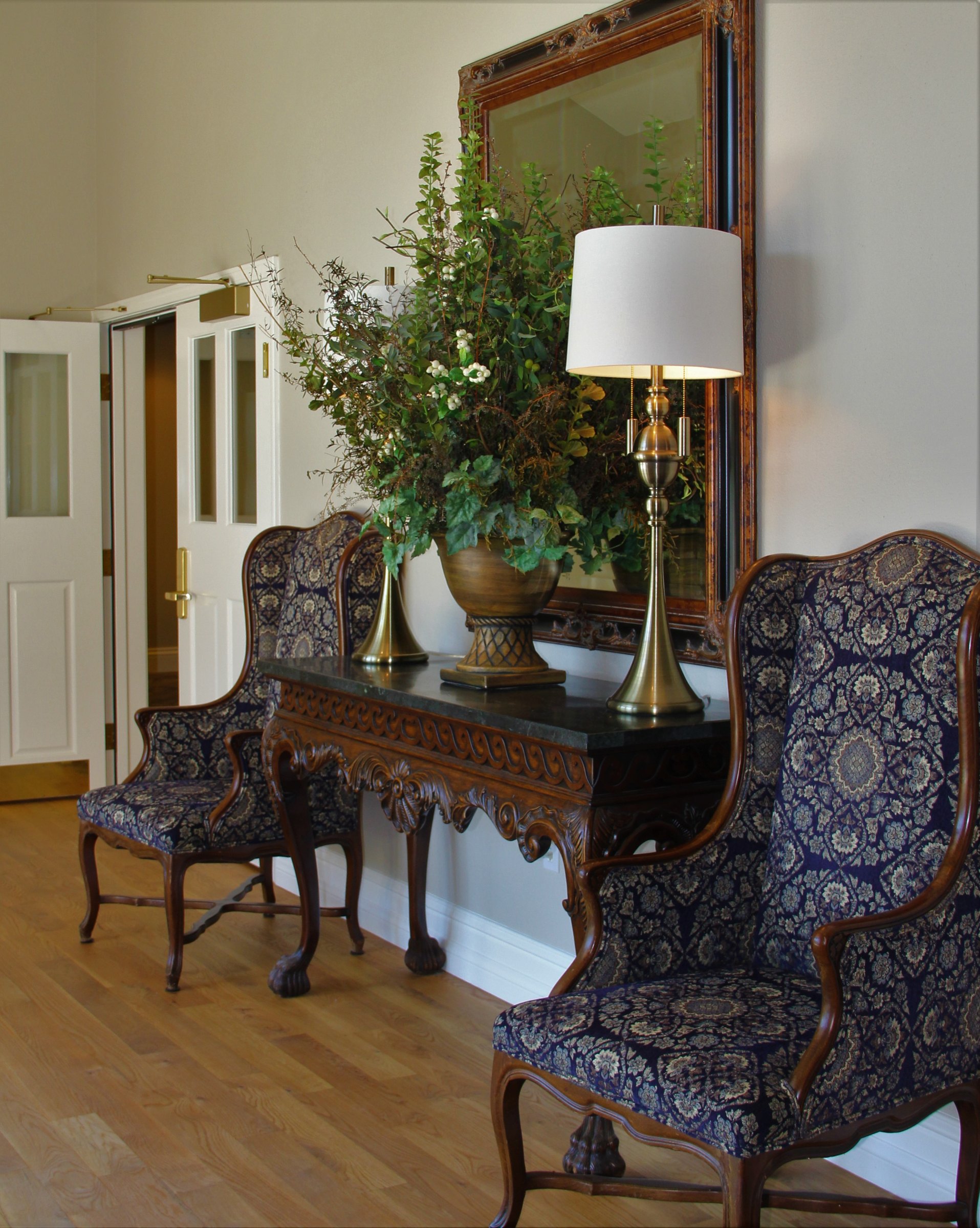 A quiet seating corner inside the Rescue funeral home lobby.