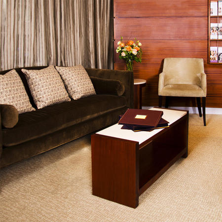 Our waiting room at Plastic Surgery & Dermatology of NYC, PLLC, offers a warm, welcoming vibe. We offer refreshments and reading material during your wait to ensure comfort and relaxation.