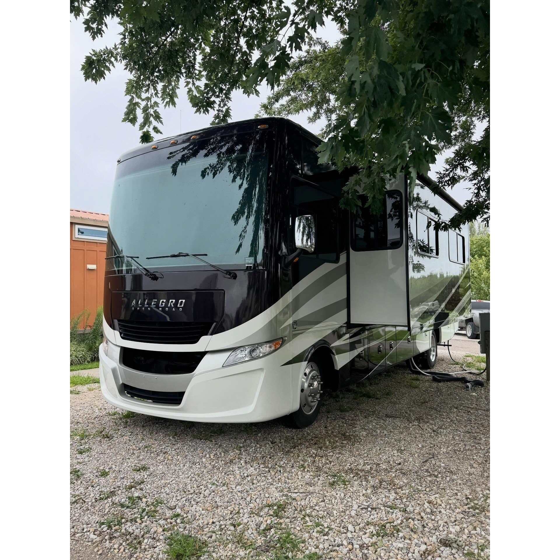 Large motorhome parked outdoors for RV detailing service, highlighting AMT Mobile Detailing’s ability to clean and maintain recreational vehicles, campers, and motorhomes.