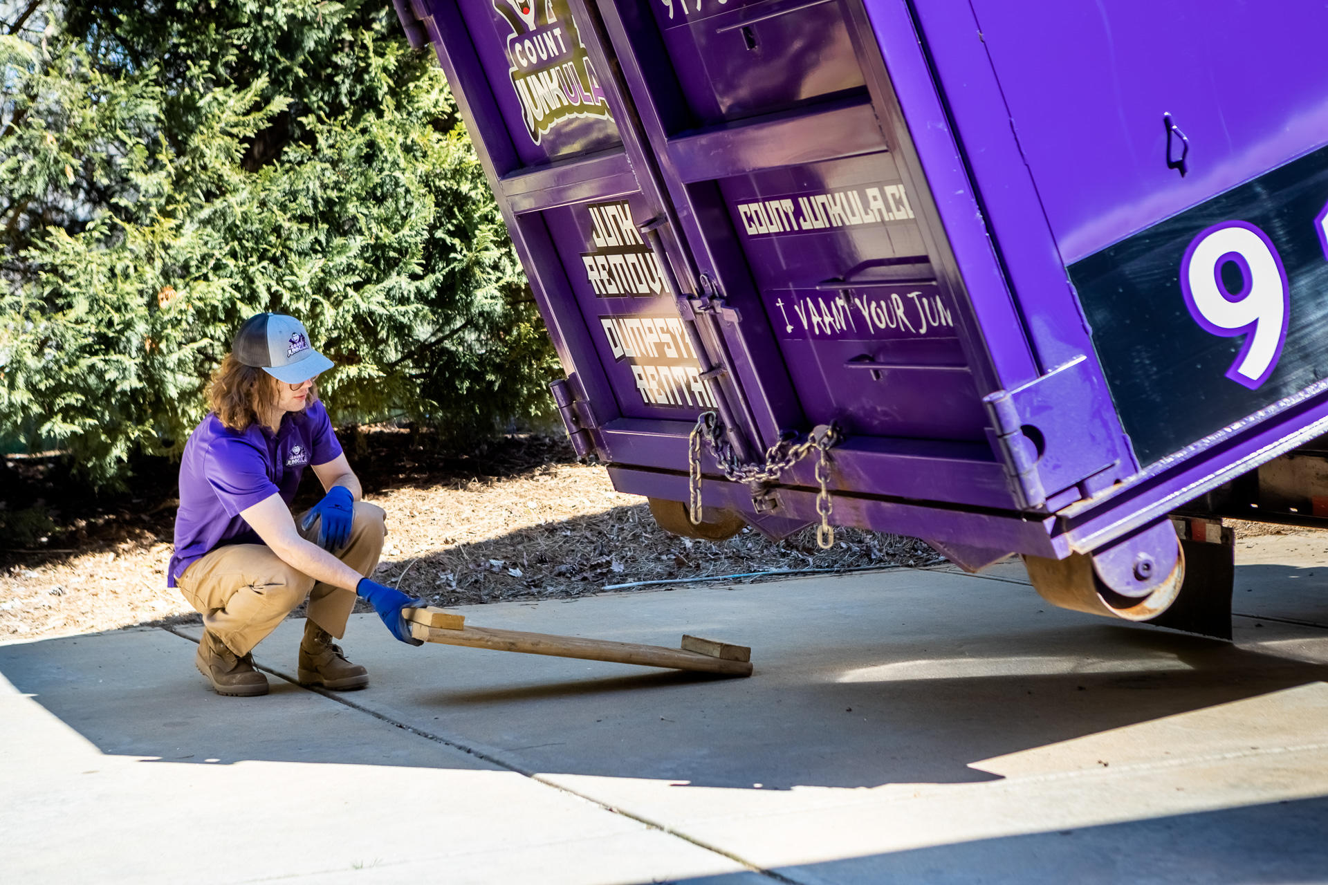 count junkula of raleigh dumpster at work