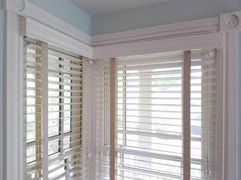 Corner windows bring such an interesting detail to the interior. We adore how these Wood Blinds with Budget Blinds of Knoxville & Maryville Knoxville (865)588-3377