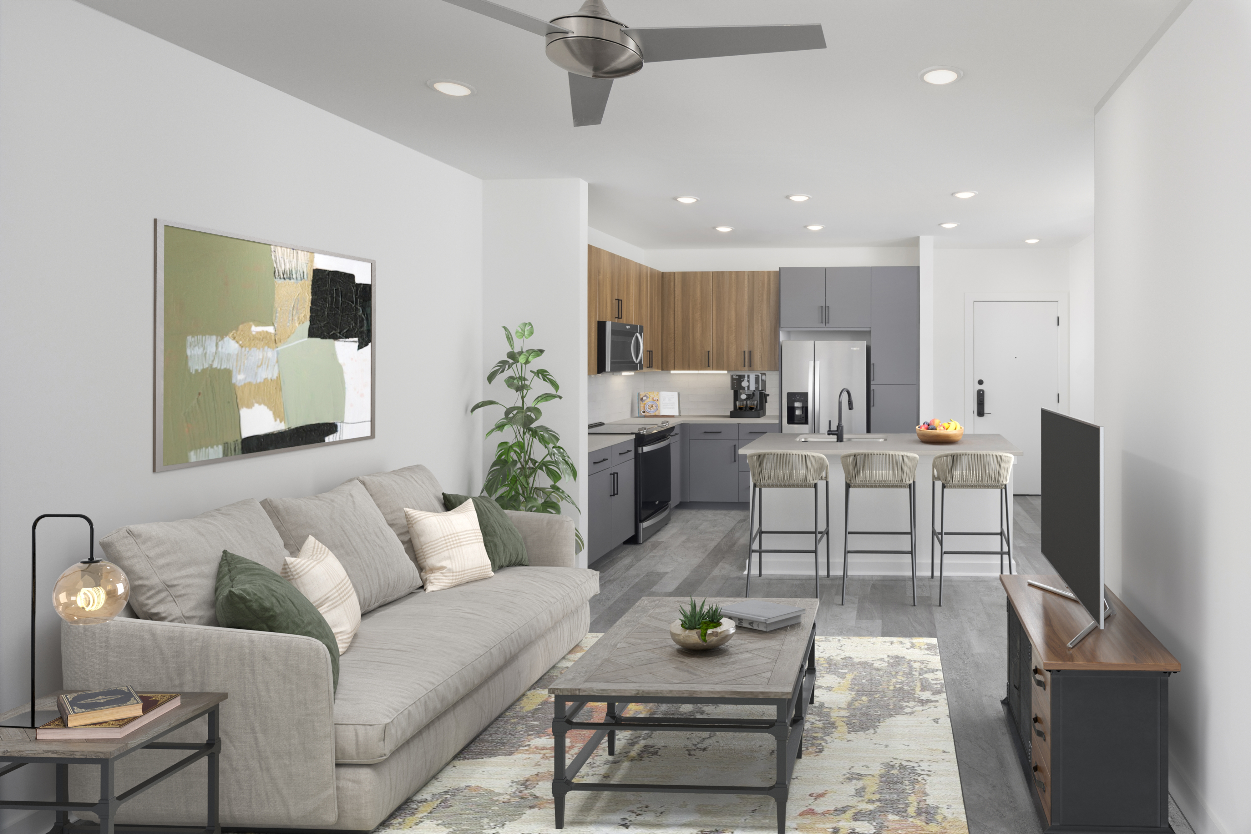 Mixed design, open-concept living room and kitchen at Camden NoDa in Charlotte, NC
