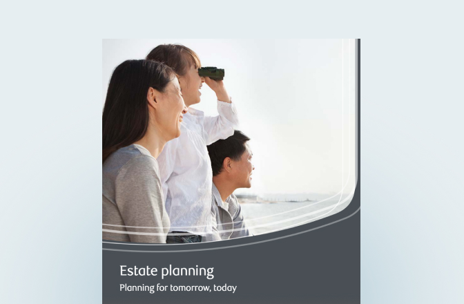 Cover of the estate planning guide with a family using binoculars as they overlook a body of water.