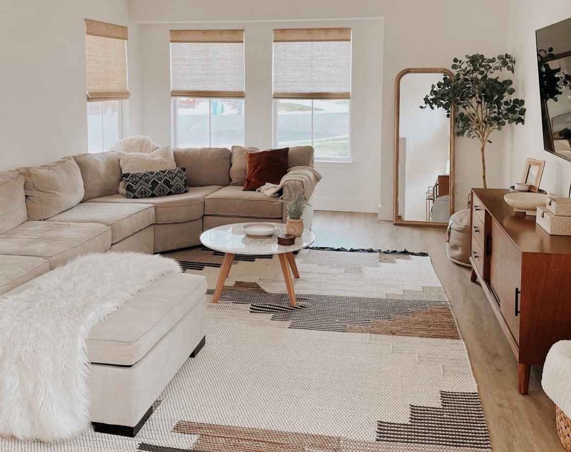 The Woven Wood Shades from Budget Blinds of Rockwall, Terrell, and Greenville add the perfect touch of nature to your living room with hand tied selected fibers, such as, Bamboo, grass, jute, wood, and rattan reeds.