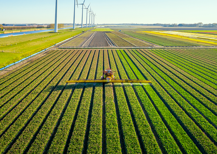 Aerial view of a farmer working the land.