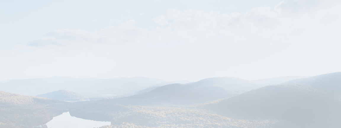 Picturesque rolling hills on a partly sunny day.
