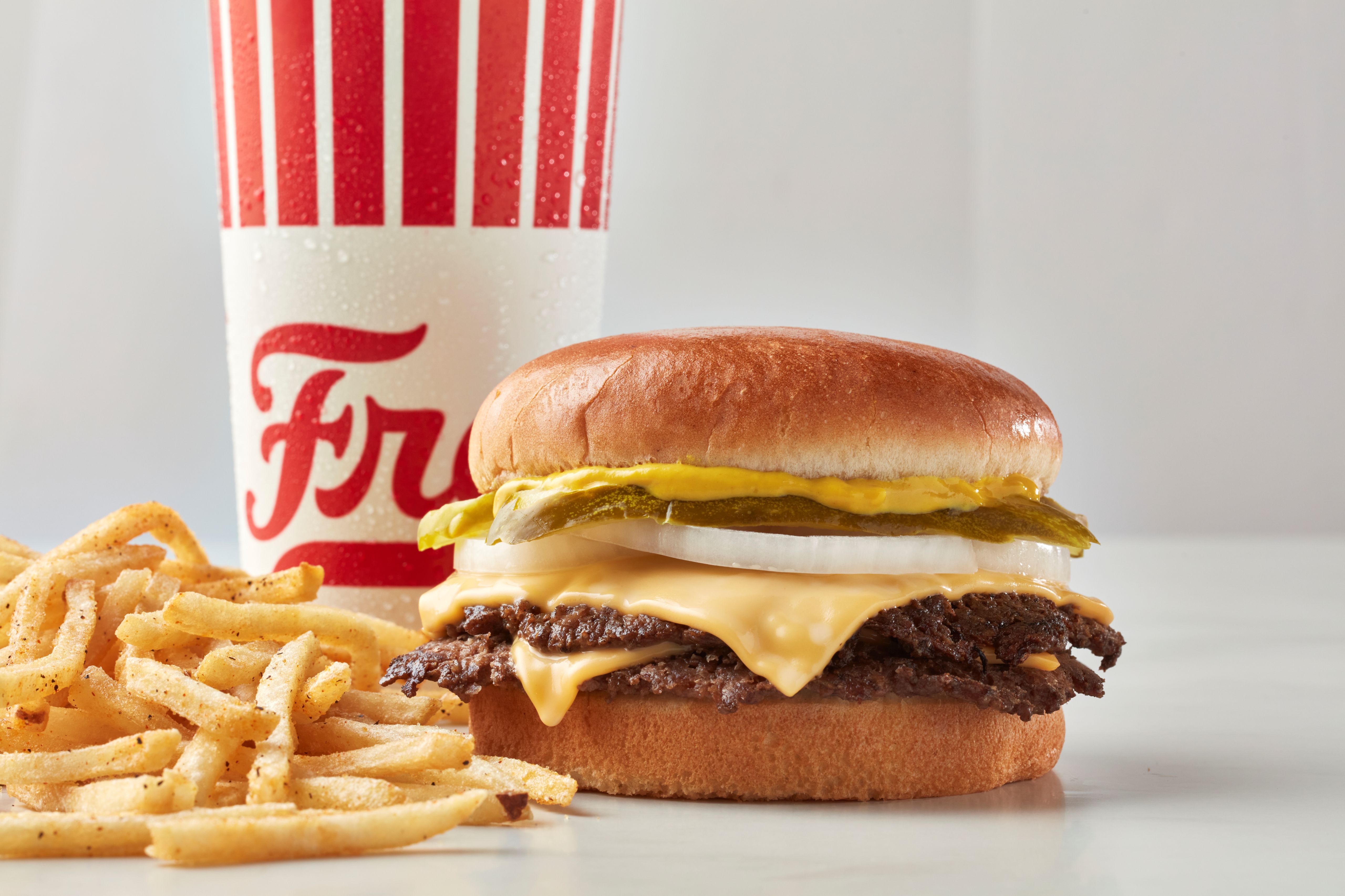 Freddy's original double steakburger with fries and a drink