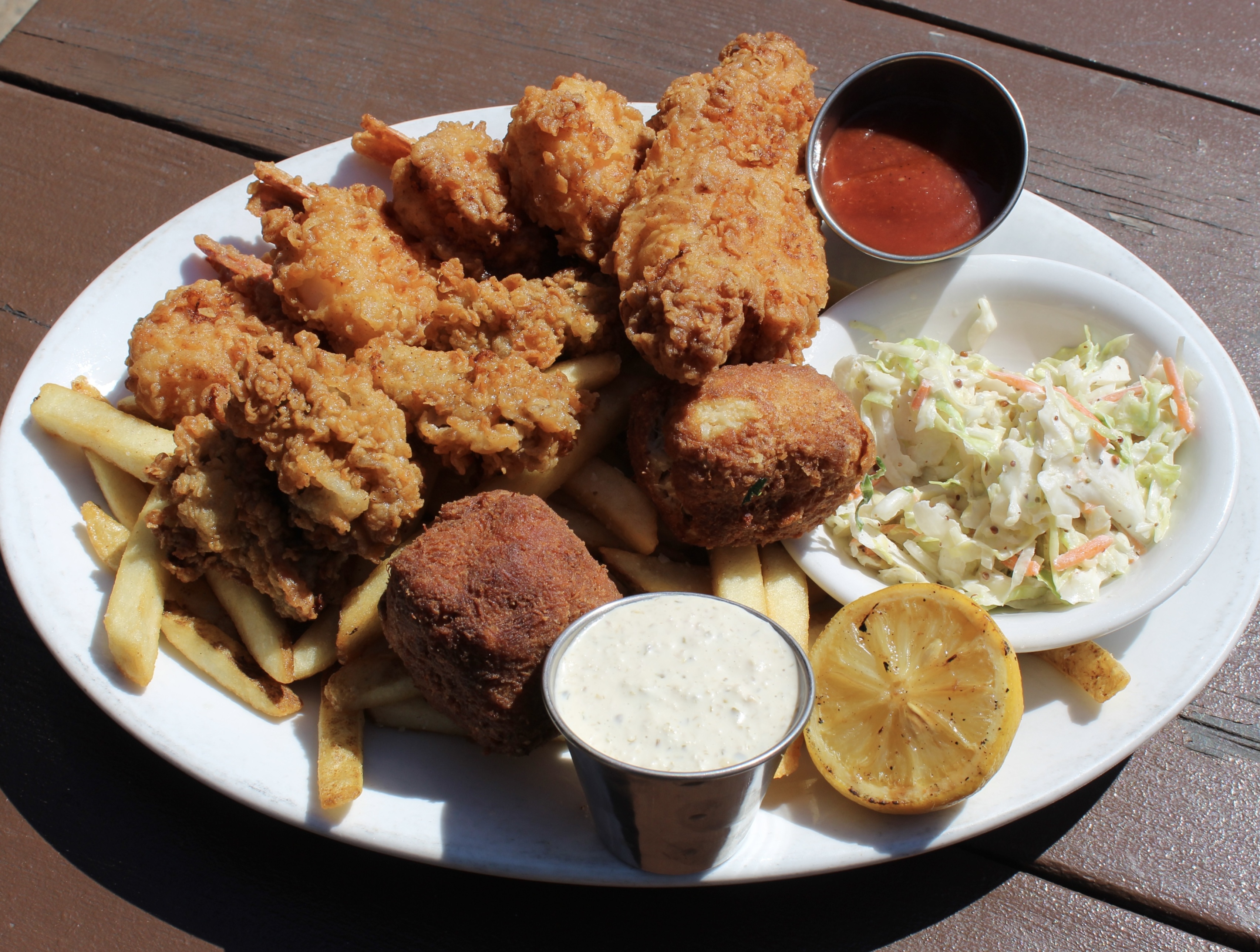 Jumbo shrimp, crab balls, fresh cod and oysters all fried golden and served with fries, coleslaw, et 