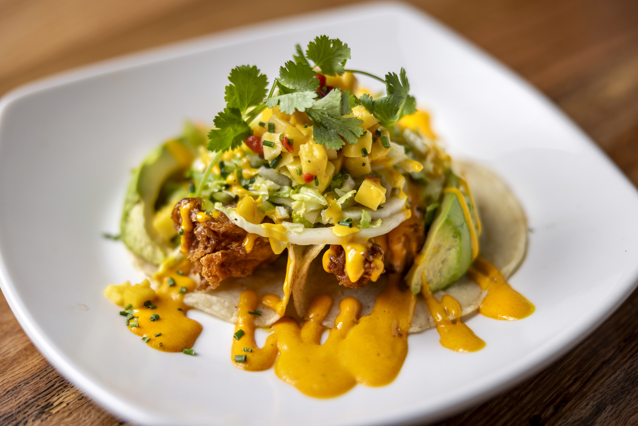 Fresh fish tacos with crisp slaw, house-made sauces, and bold coastal flavors, perfect for a sunny Palm Desert day