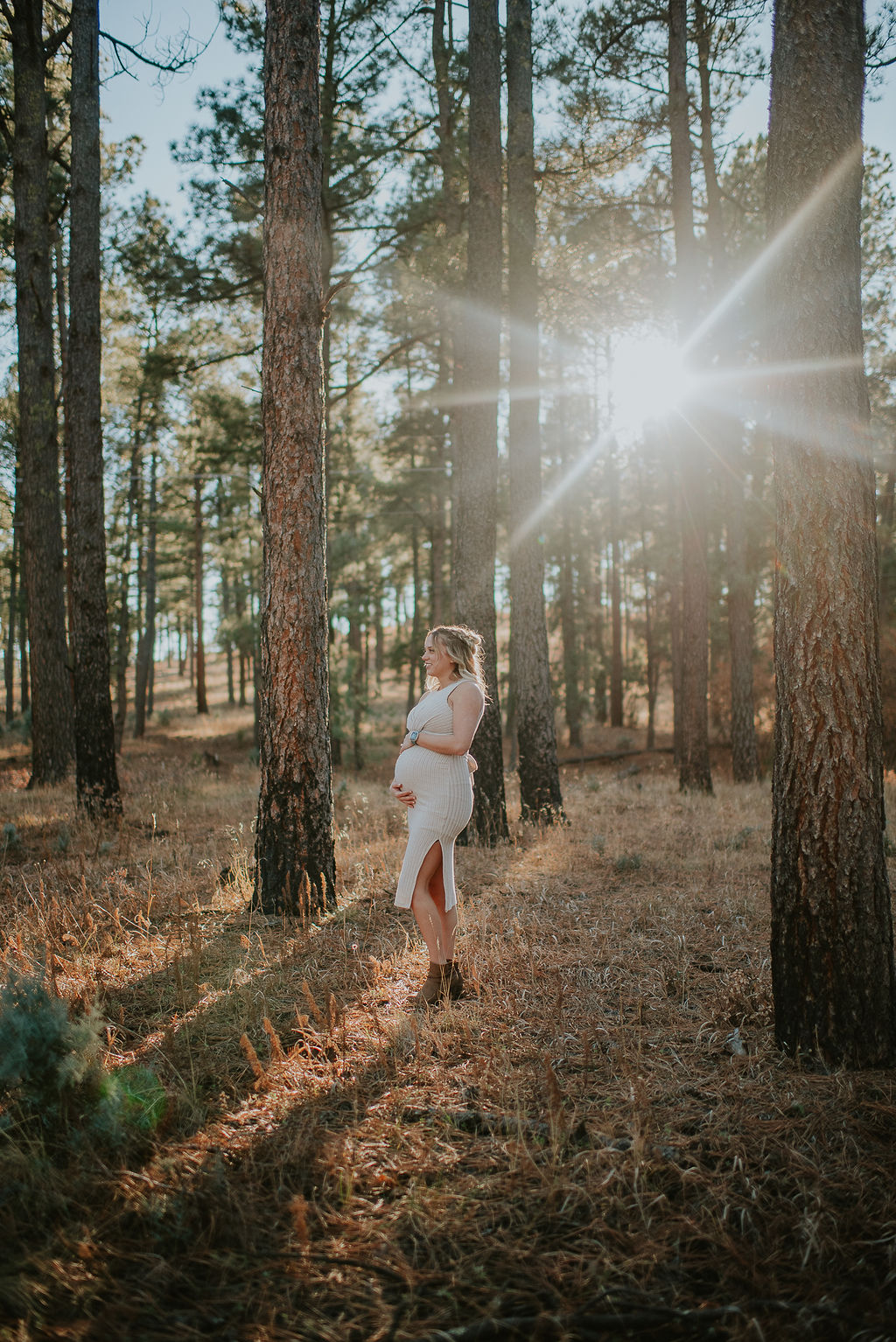 Loving Mother taking maternity photos in Colorado