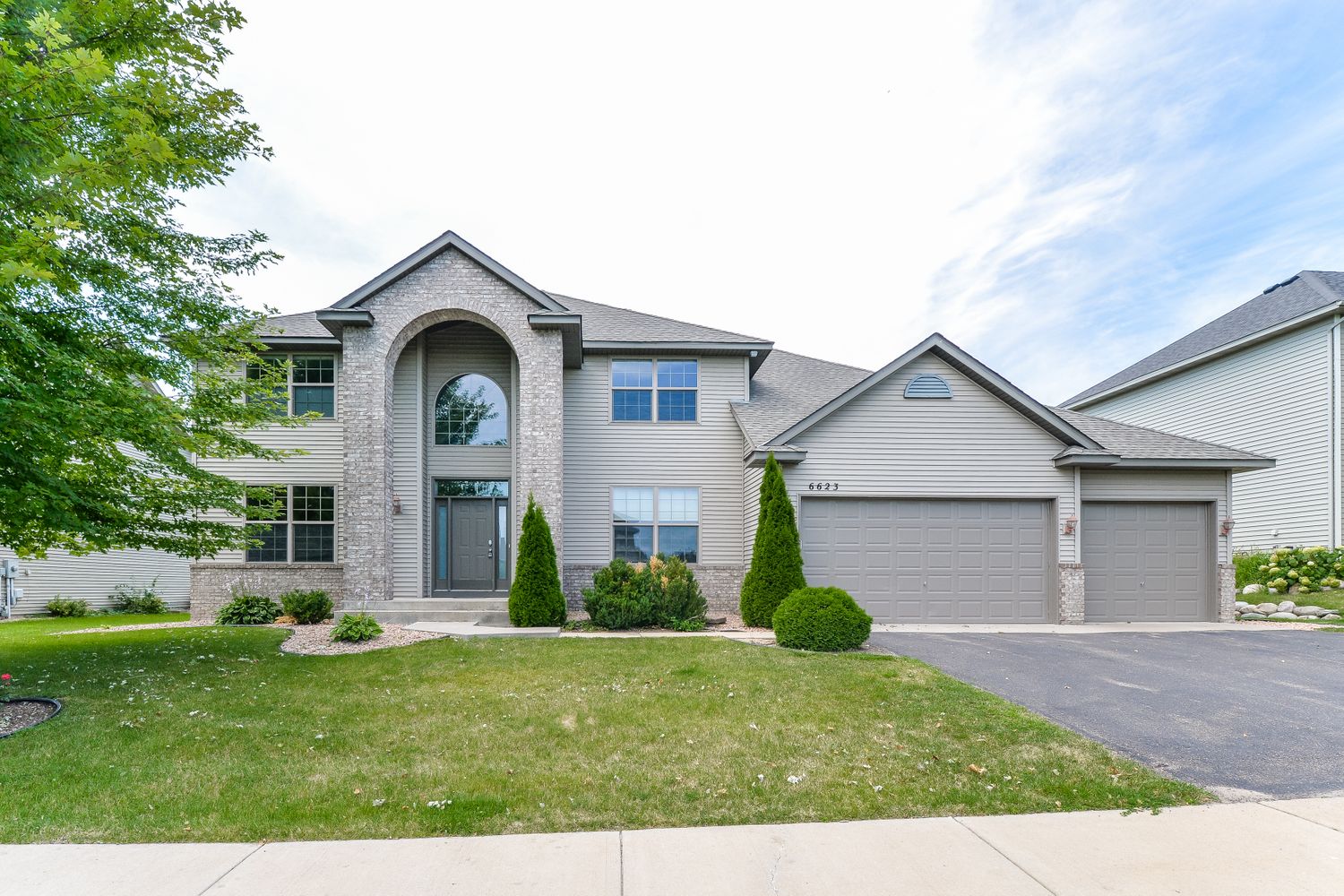 Stunning home with a three-car garage at Invitation Homes Minneapolis.