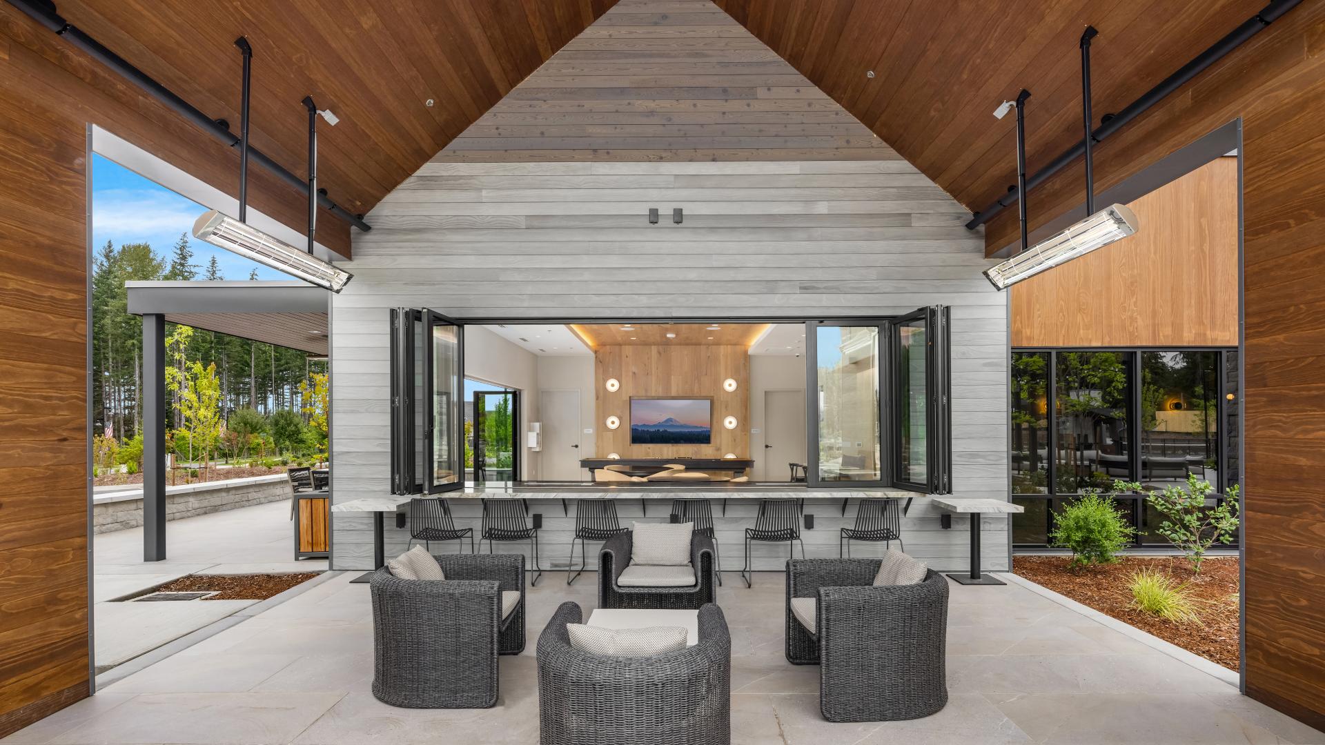 The smaller club lounge with wet bar