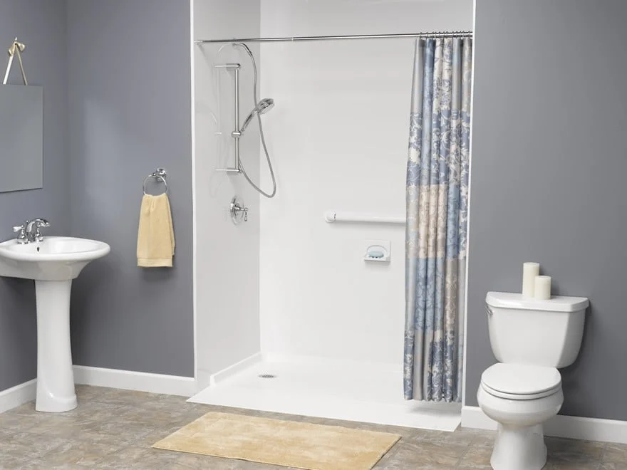 Roll-in shower with barrier-free entry and accessible safety features