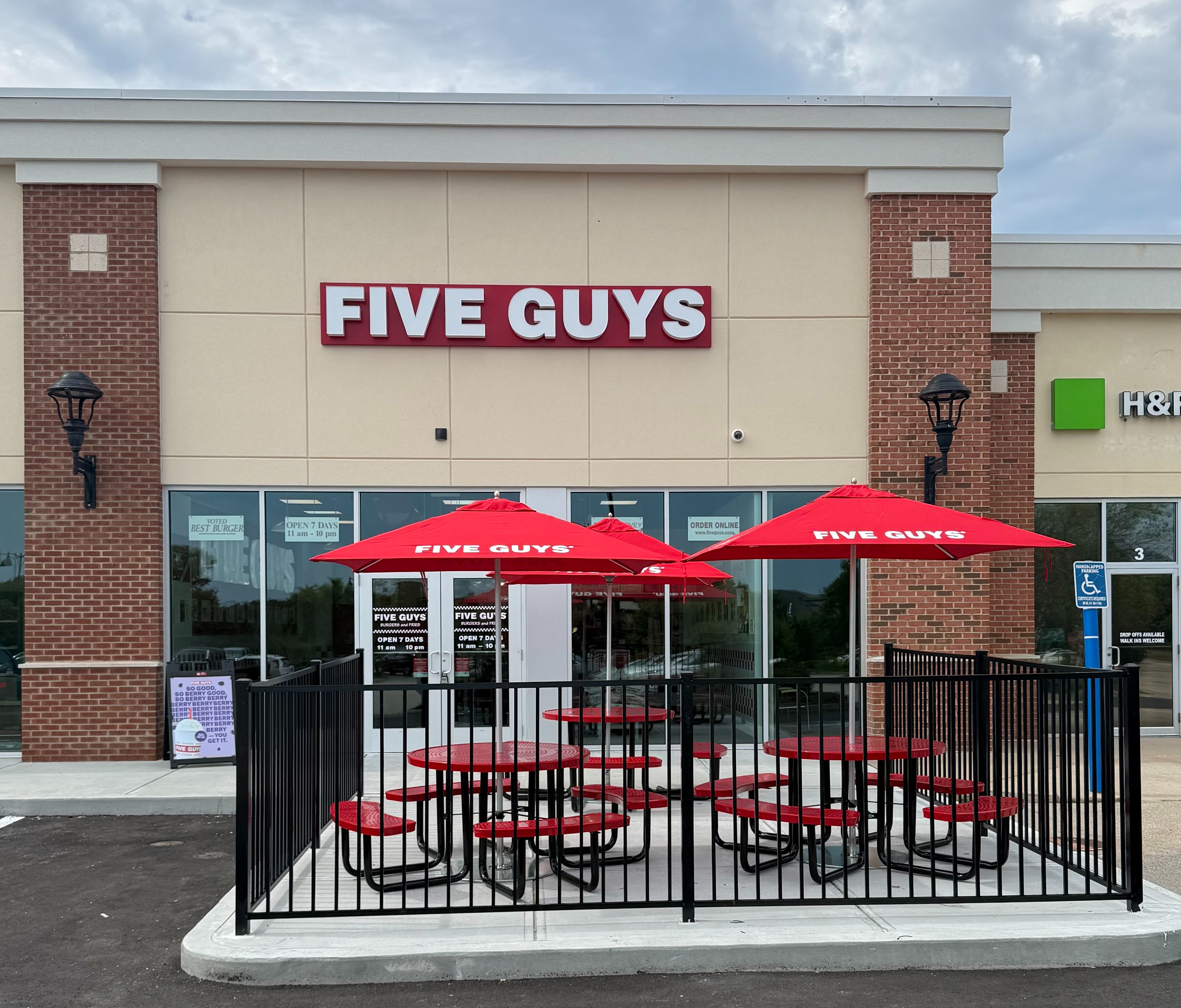 Exterior photograph of the Five Guys restaurant at 143 Franklin Street in Westerly, Rhode Island.