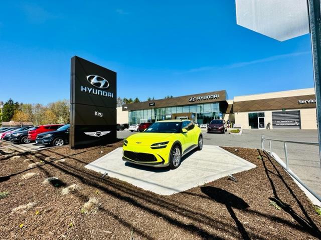 Key Hyundai of Milford display vehicle and sign outside the dealership