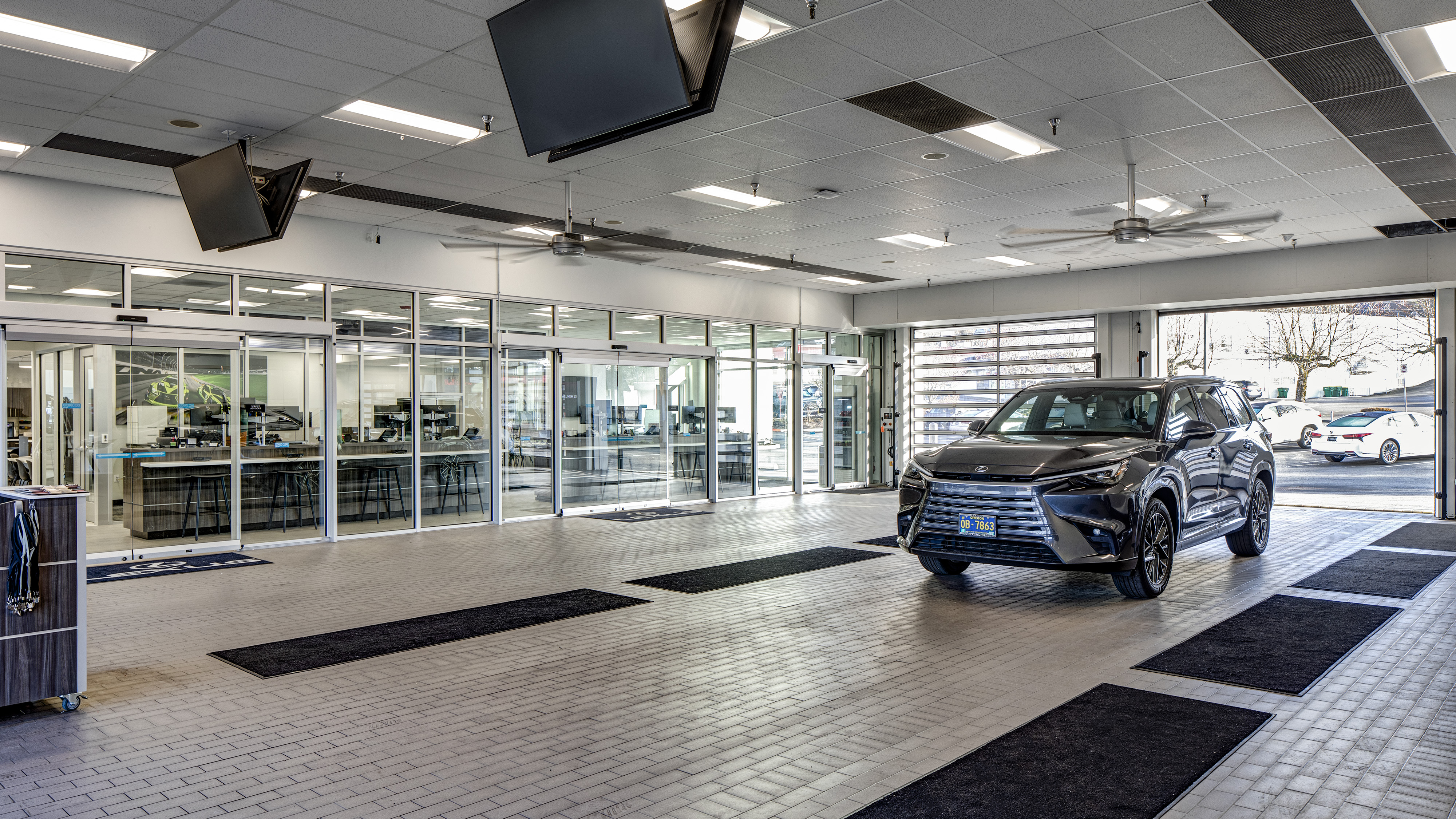 A Lexus vehicle in the service center driveway