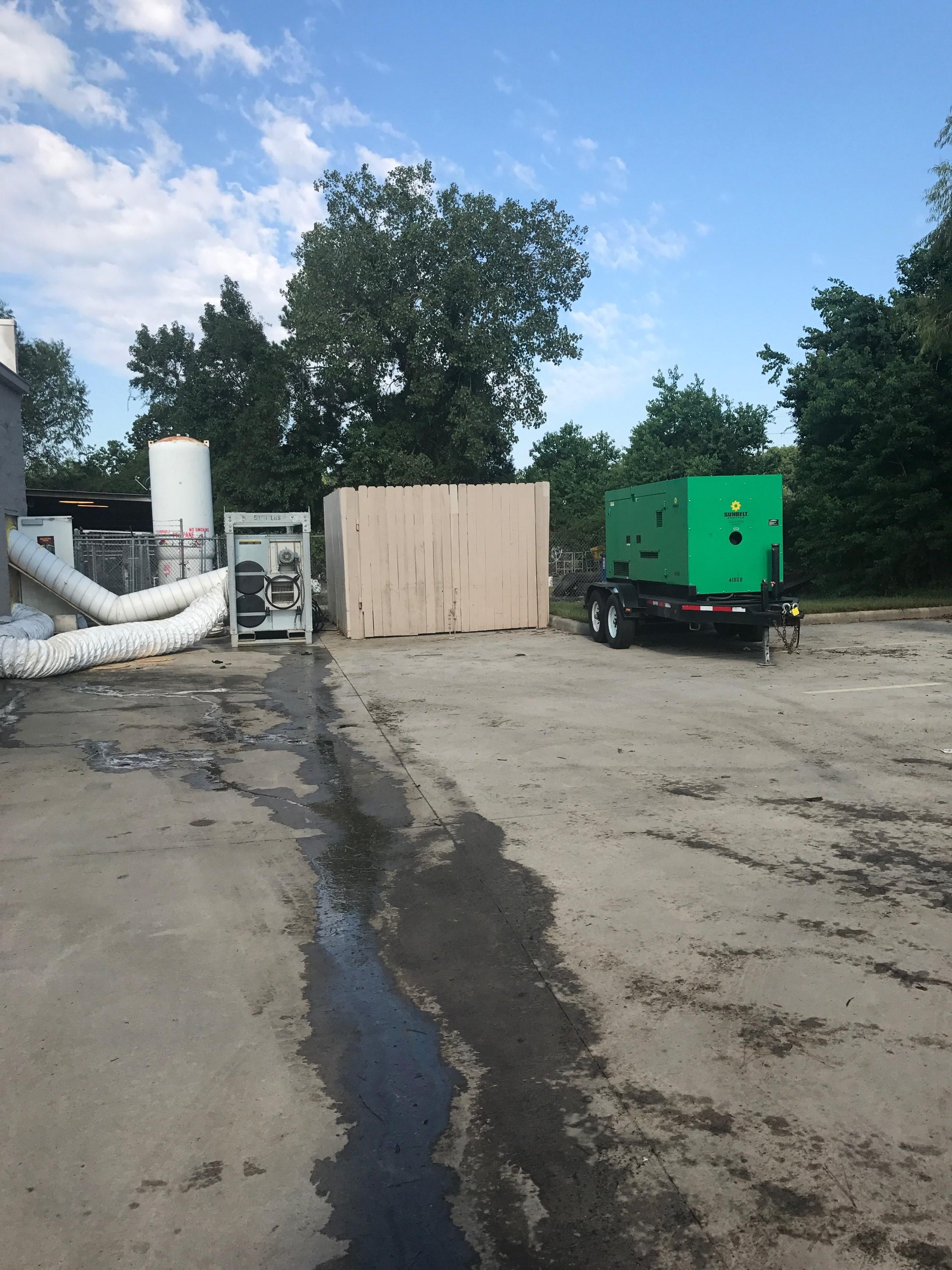 SERVPRO of The Seacoast has set-up extraction equipment at this Advance Auto Parts store to remove the standing water left by Hurricane Harvey.