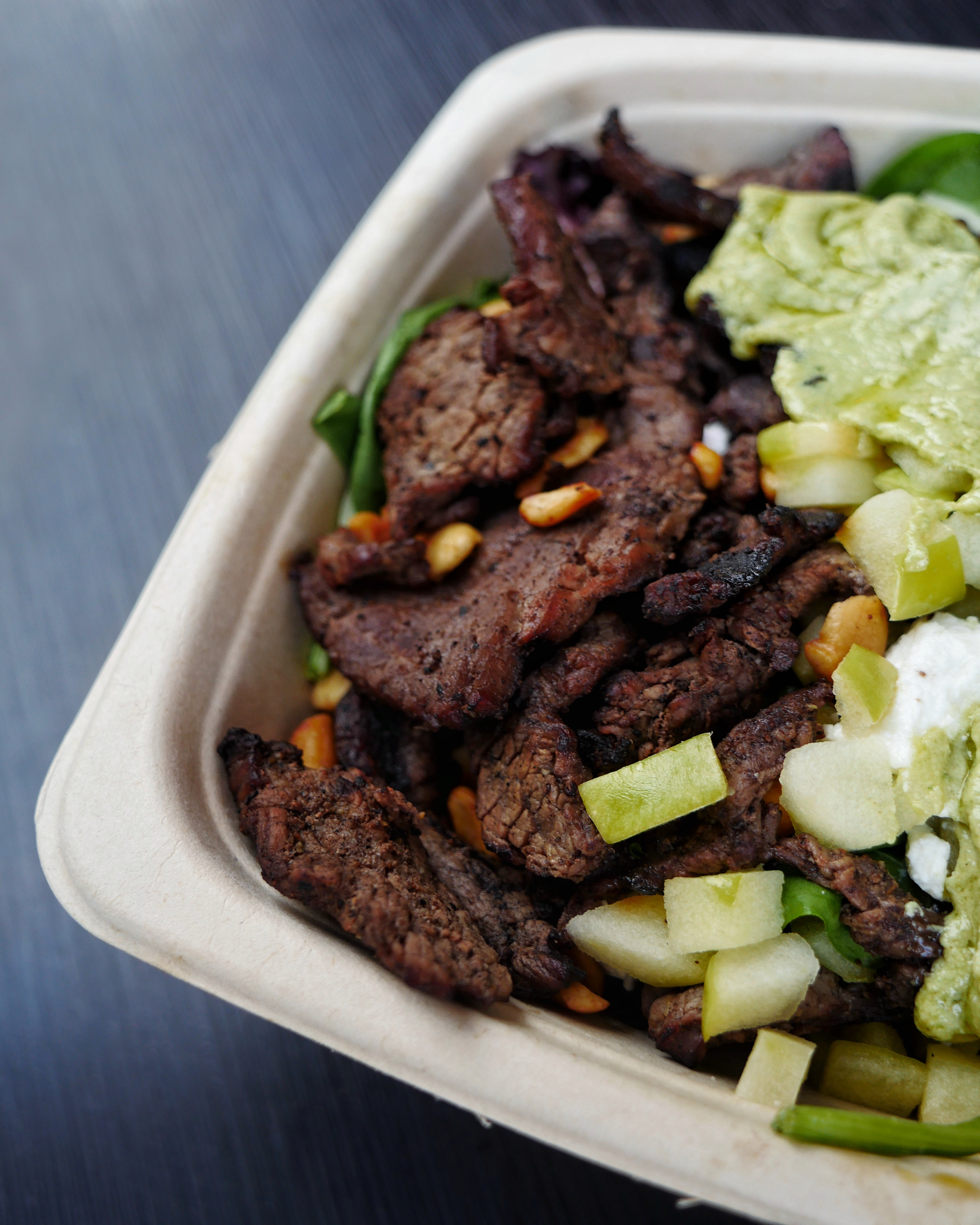 Underworld: Grilled Steak with granny smith apples, pickles, toasted cashew nuts, goat cheese and white sesame sauce