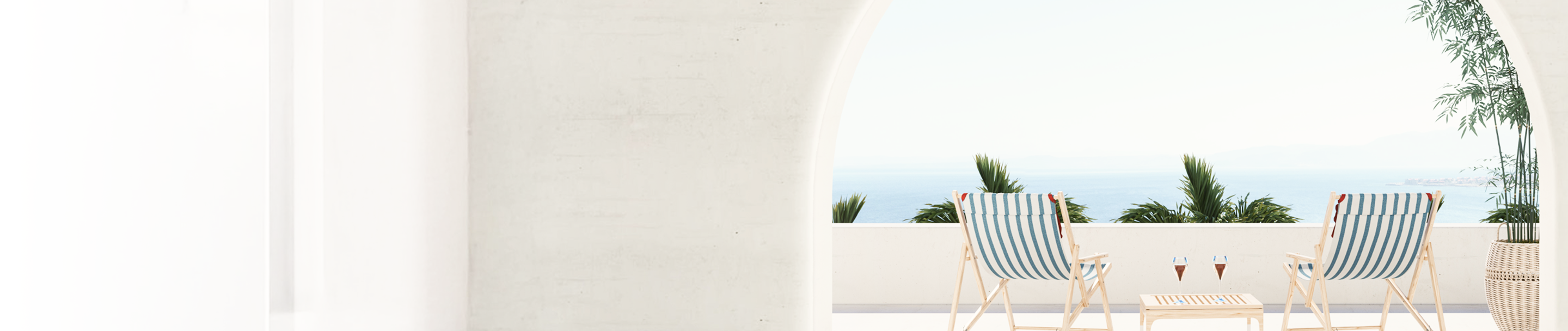 A serene view of an inviting patio with two beach chairs and a view of the sea.