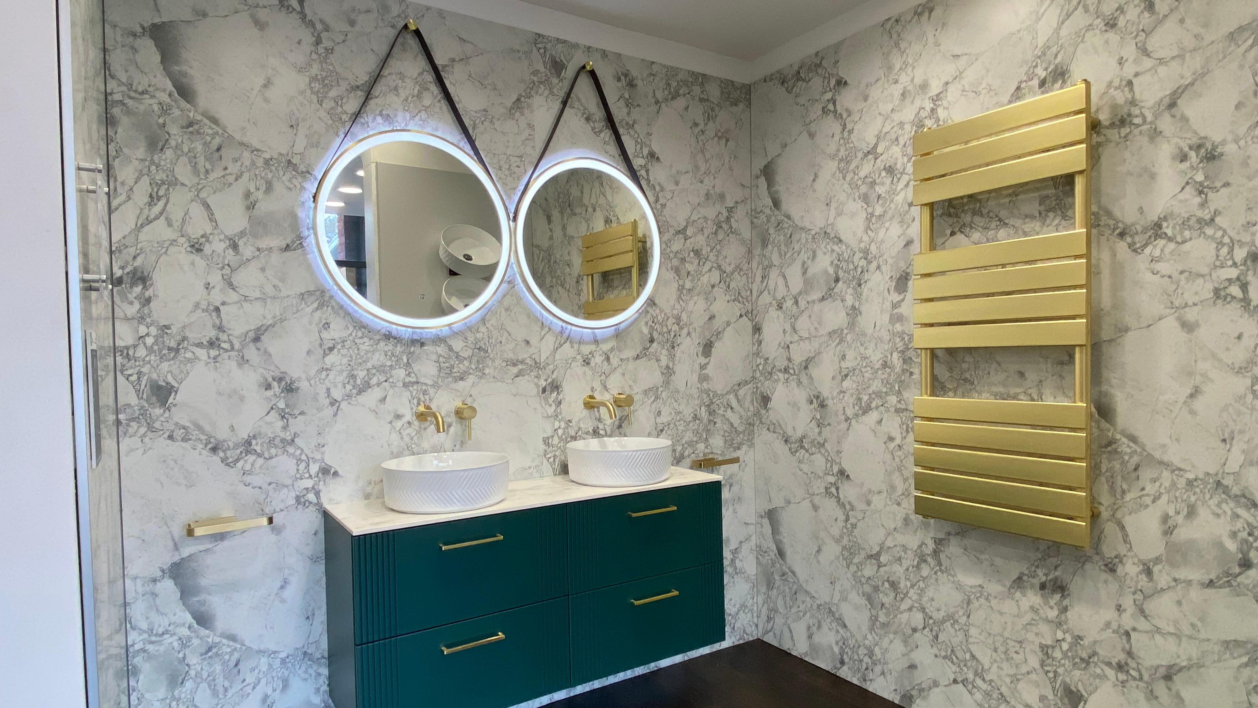 Wall hung bathroom display featuring double basin and mirror