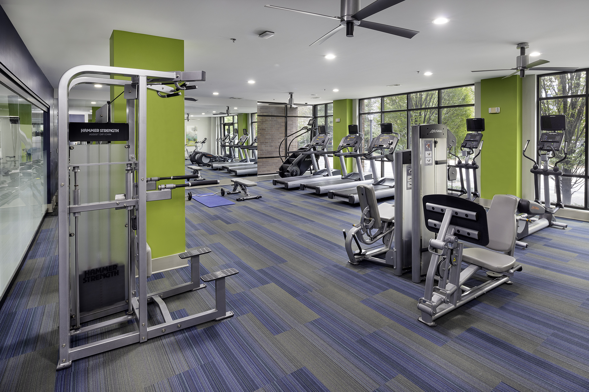 Fitness center with cardio and strength training equipment at Camden Buckhead Square apartments in Atlanta, GA